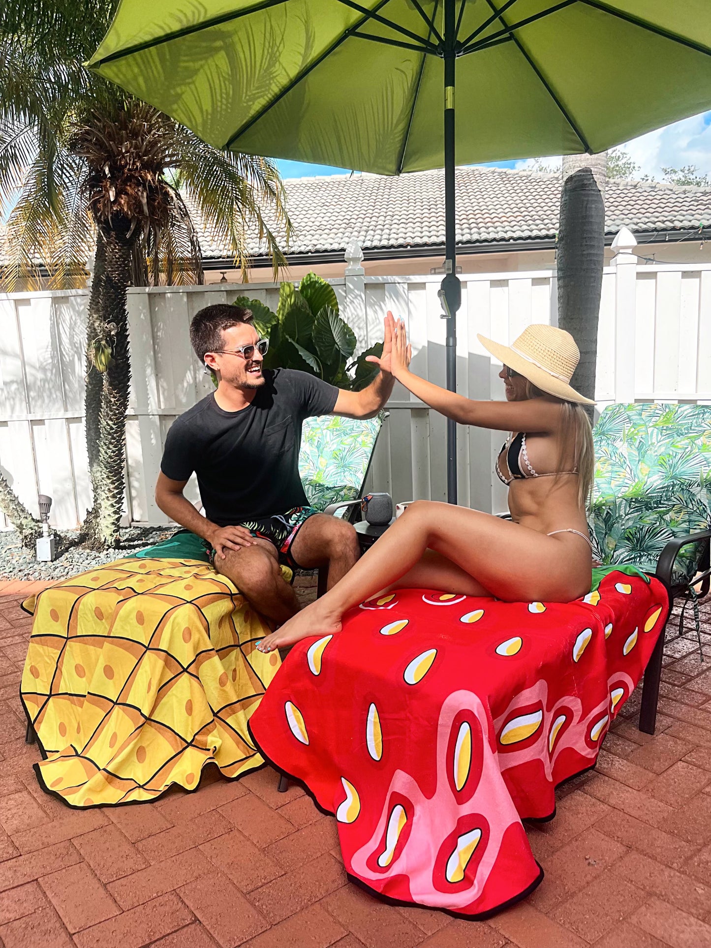 Berry Bliss Beach Towel beautifully spread out on a beach chair under the sun
